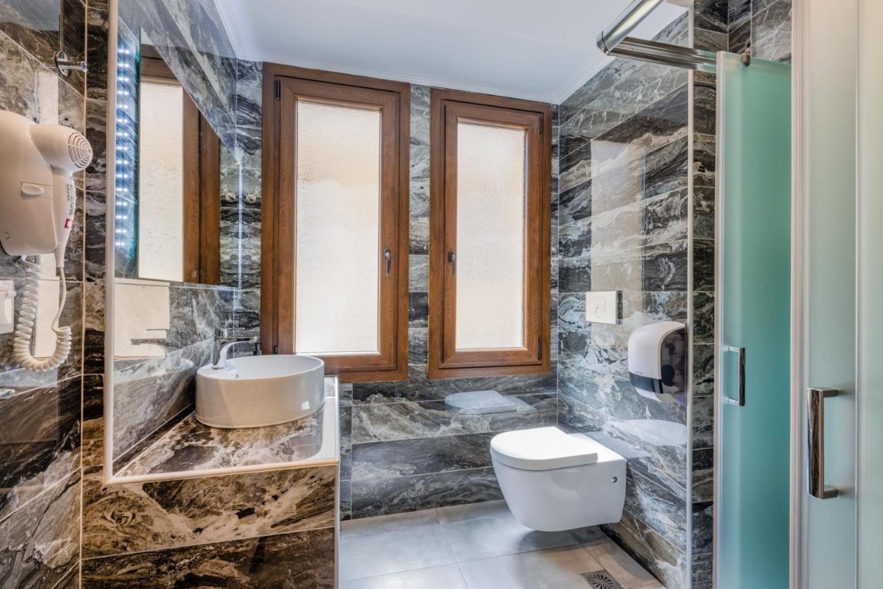 Penelope Luxury Suites Fourka Exterior photo
